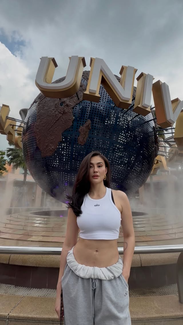 Instagram post by @agnezmo for VisitSingapore. Caption reads: Some places don’t fade, they stay with you. From....