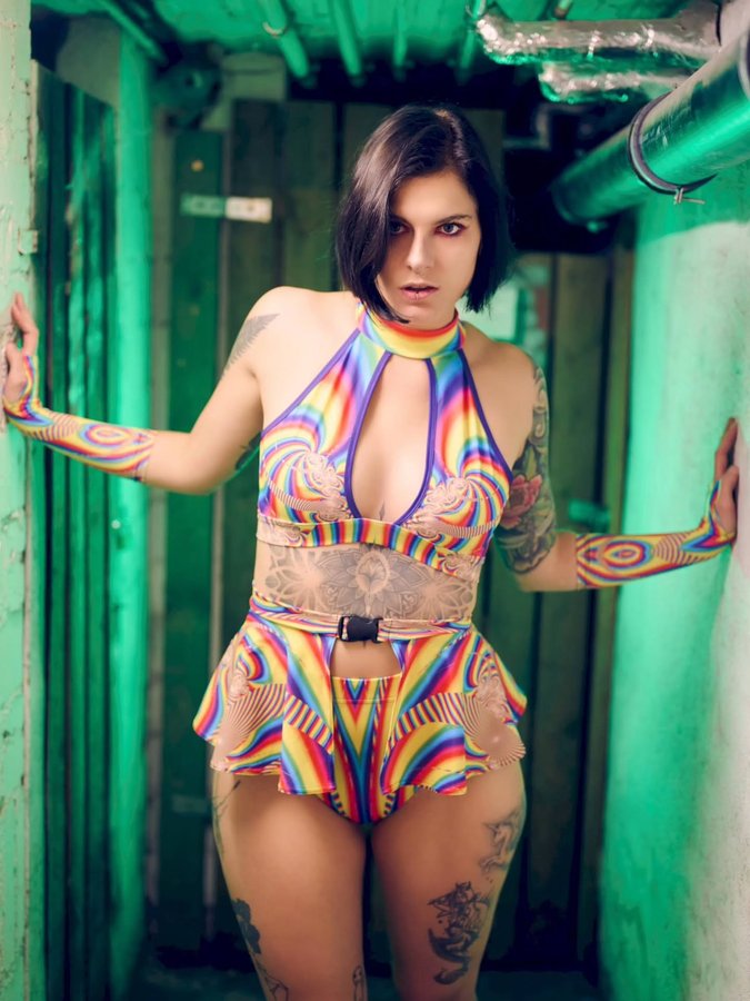 Instagram post by @jenn_jenn.x for Devil Walking. Caption reads: [...] Pride is power. Outfit #gifted by....