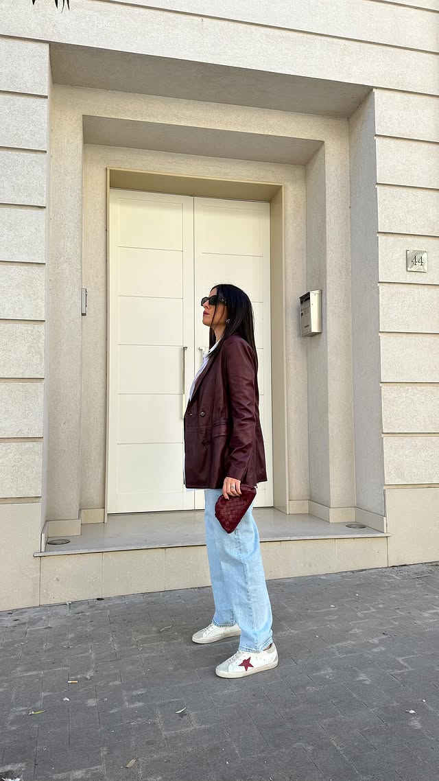 Instagram post by @eleonorstorre for YOOX. Caption reads: My fave burgundy outfit via @yoox 
#YooxMyLook  a....