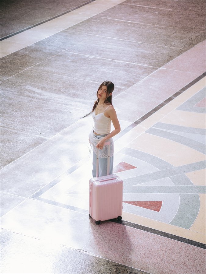 Instagram post by @pahnthitta for RIMOWA. Caption reads: pinky way to your heart 🩰⭐️

@rimowa
#RIMOWA....