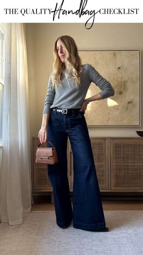 Instagram post by @thenewyorkstylist for Strathberry. Caption reads: [...] below  ⬇️ and I’ll DM you my favorite....