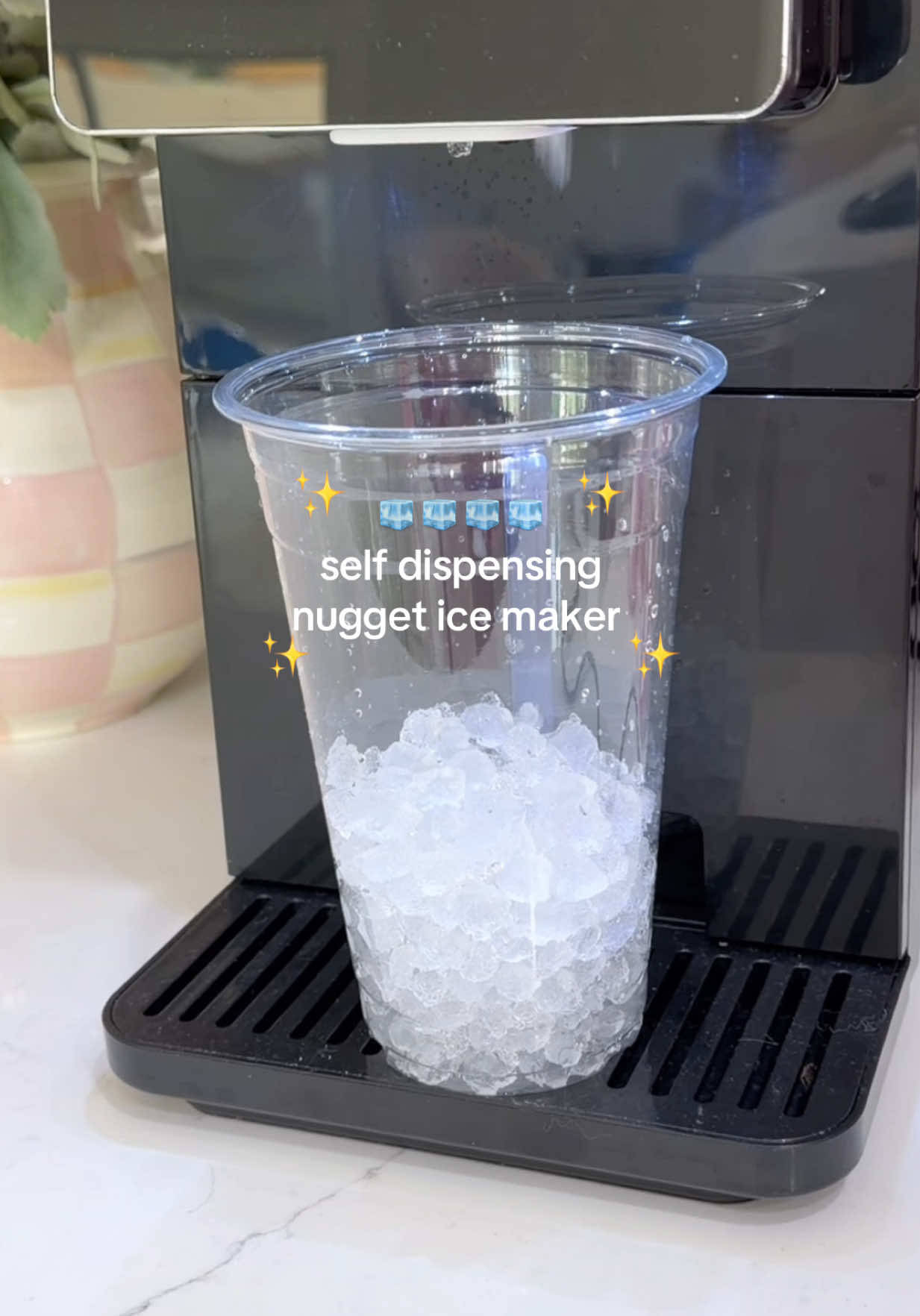 TikTok post by @rachlmcdonald for Cowsar Appliance. Caption reads: [...] #icemaker #icecube #icemachine @Cowsar....