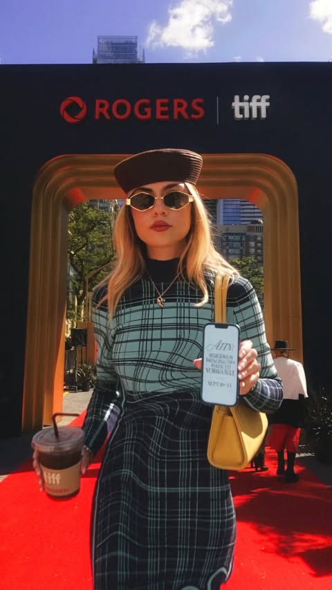 Instagram post by @lizzi.jpg for Rogers. Caption reads: [...] memo? TIFF is back in Yorkville ☕️🎬 @rogers....