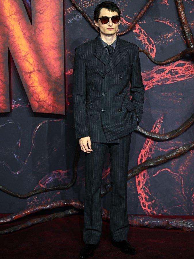 Instagram post by @finnwolfhardofficial for Paul Smith. Caption reads: Finn Wolfhard goes full Mod Mode for the Stranger....