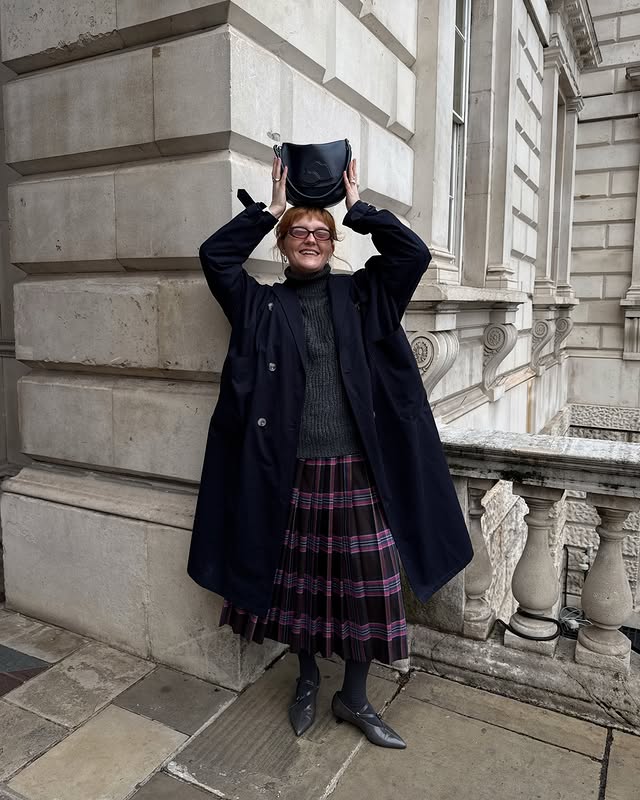 Instagram post by an influencer for Finery London. Caption reads: [...] 💙 Coat @lfmarkey * Jumper @finerylondon *....