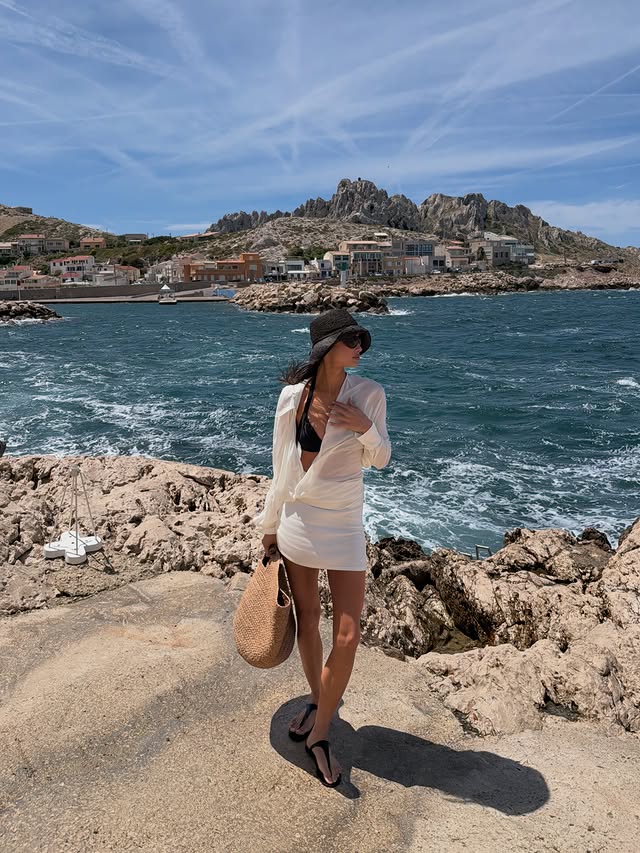 Instagram post by @kelseymerritt for MESHKI. Caption reads: Provence summer @meshki #meshkipartner.