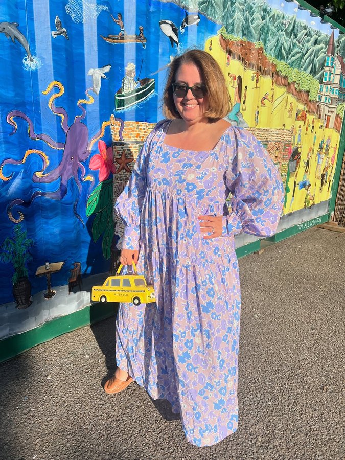 Instagram post by @whoisthatlondonmum for OMNES. Caption reads: Weekend vibes 💜💛 Dress @omnes (old) Bag:....