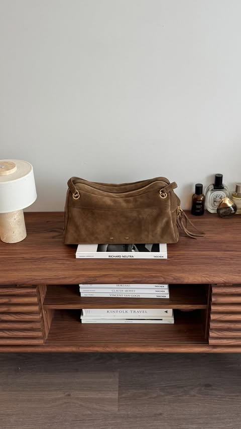 Instagram post by @ludan_u for Fabrique. Caption reads: [...] $20 off bags myLU for 10% off clothes....