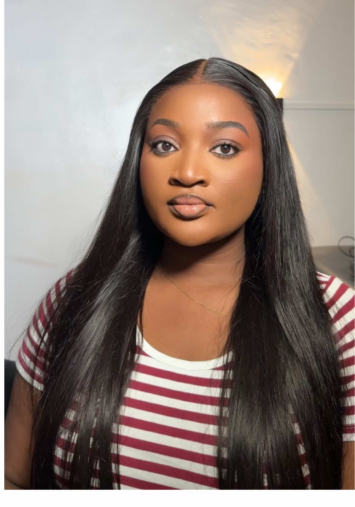 TikTok post by @oreoluwa_sa for Amanda Hair. Caption reads: [...] perfect Glueless silky straight wig👌....