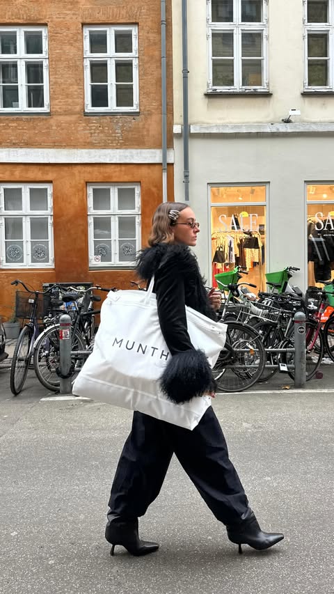 Instagram post by @vitamin__sea_ for Munthe. Caption reads: another outfit change from #cphfw for....