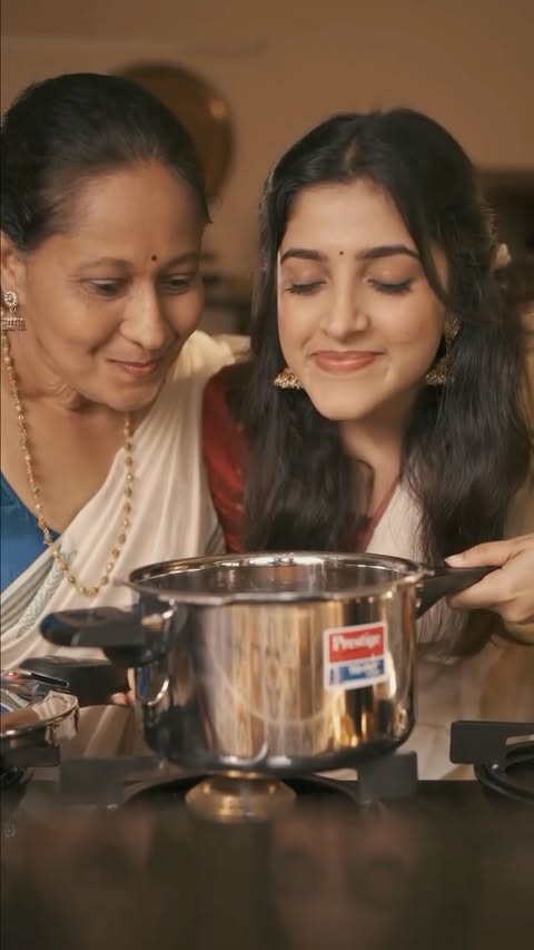 Instagram post by @meenaaxi_ for TTK Prestige. Caption reads: [...] now and make this Onam effortless!....