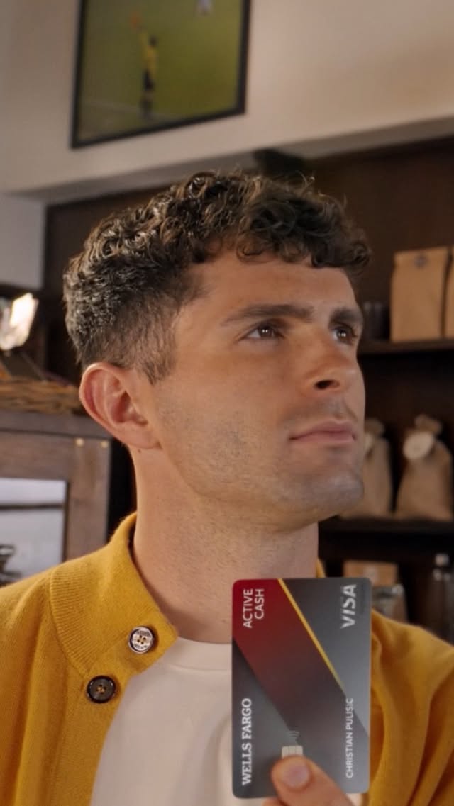 Instagram post by @cmpulisic for Wells Fargo. Caption reads: [...] Cash Visa® Credit Card from @visa....