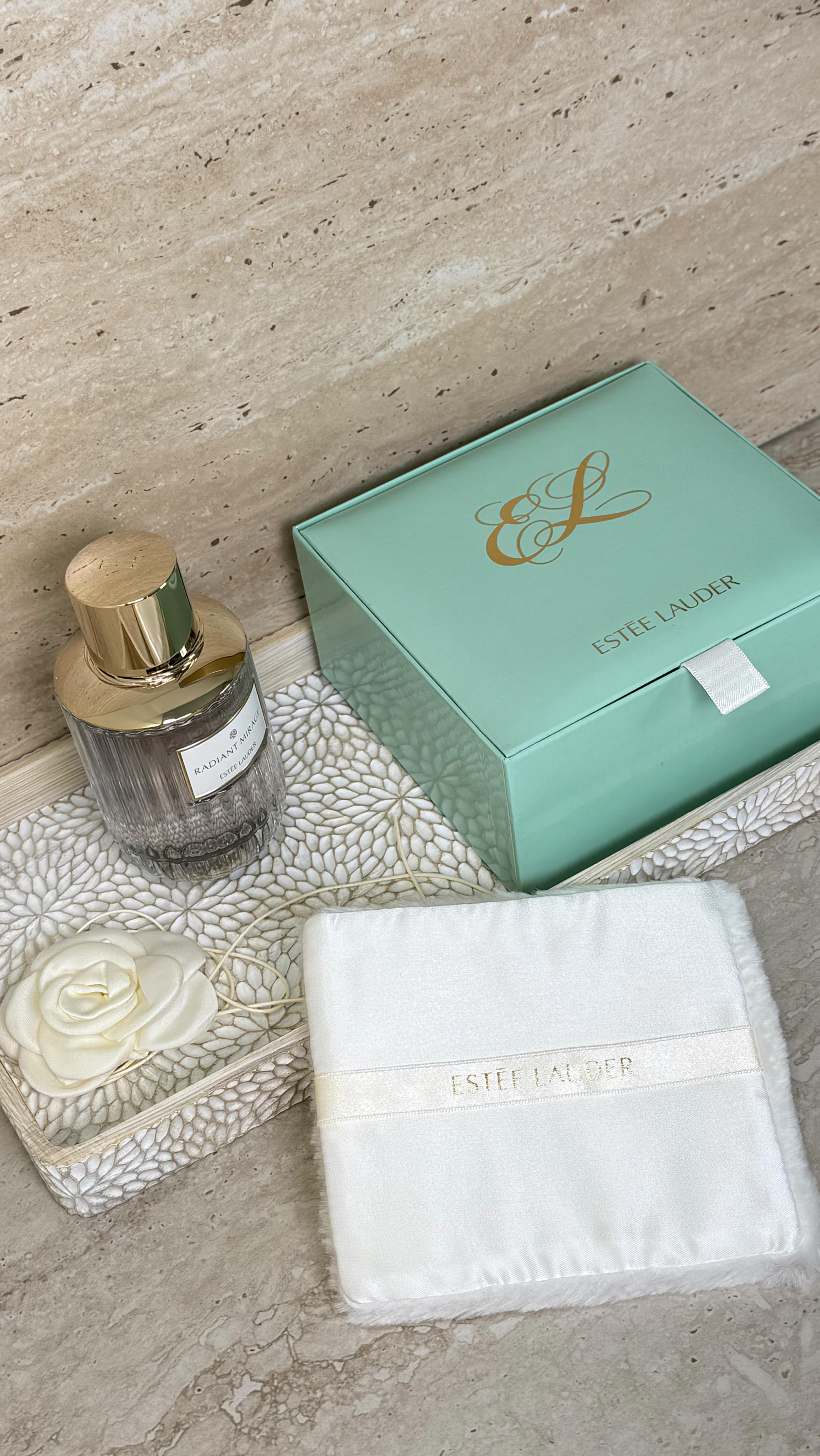 Instagram post by @rolaa.safar for Namshi. Caption reads: Radiant Mirage @esteelauderme 
✨ الغموض والرقي في....