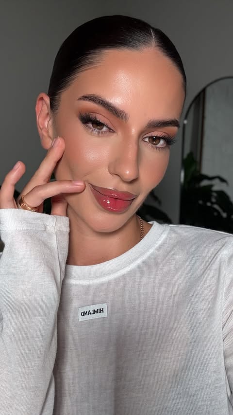 Instagram post by @iomakeupofficial for nooni. Caption reads: Grab your NOONI Lip Oil on Amazon now at such an....