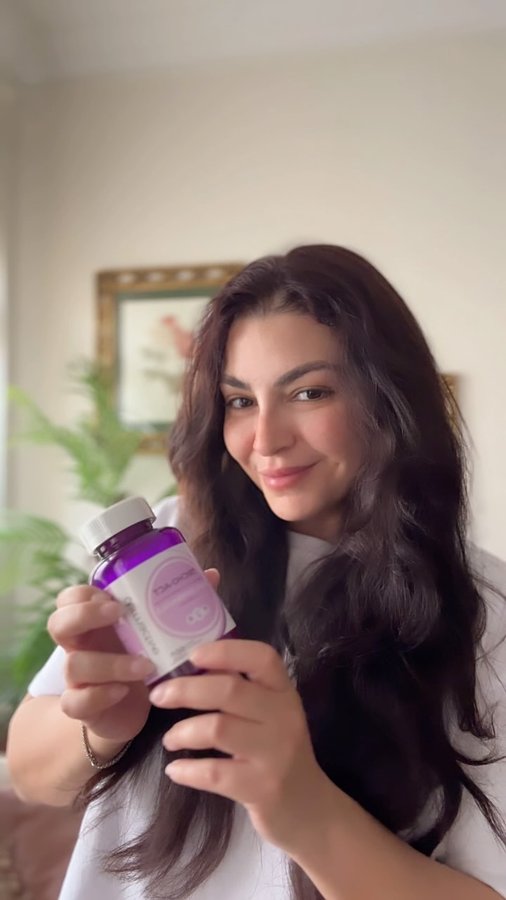 Instagram post by @by.heba.taher for dermactive. Caption reads: [...] nail supporter TRICHO-ACT gummies by....