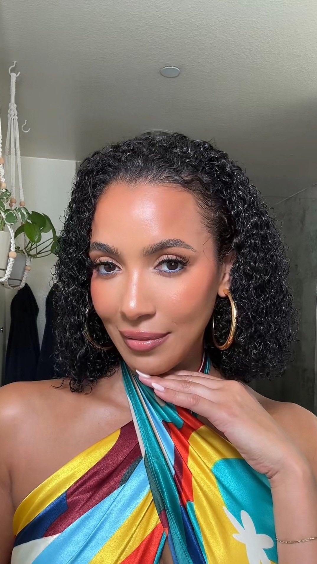 Instagram post by @officialjulissab for The Mane Choice. Caption reads: A product that allows my curls to thrive past day....