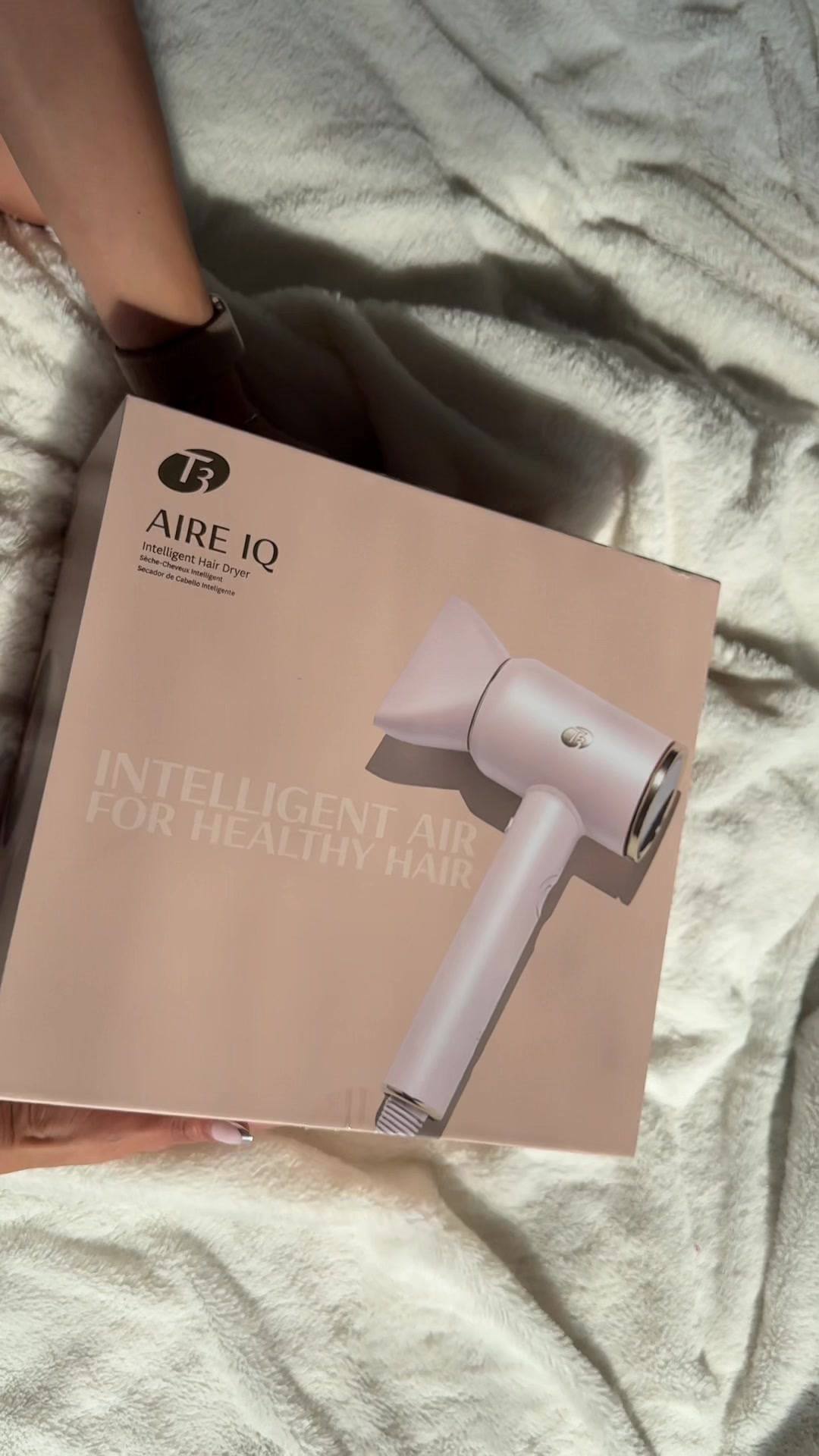 TikTok post by @meganvershan for T3 Micro. Caption reads: ASMR unboxing  @T3 Micro intelligent air dryer 💕.