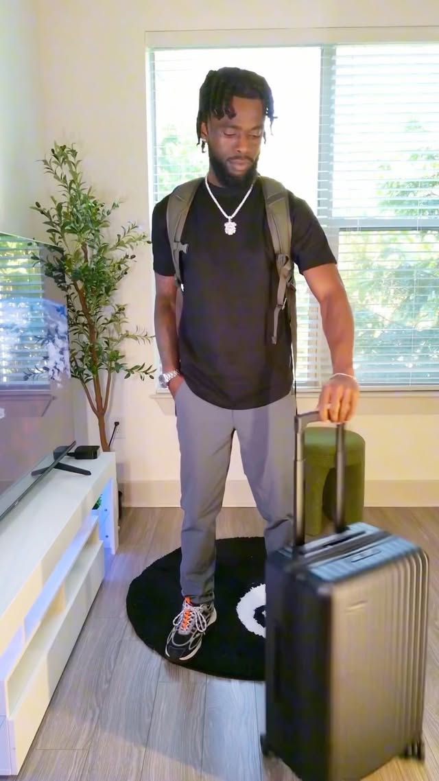 Instagram post by @romeeperry for NOMATIC. Caption reads: GRWM for the airport ✈️🌎 @nomatic check out their....