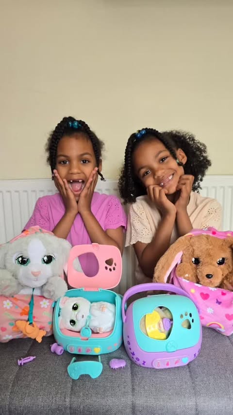 Instagram post by @elizabeth_rebecca_twins2020 for Basic Fun!. Caption reads: [...] Baby Paws are available now on Amazon.....