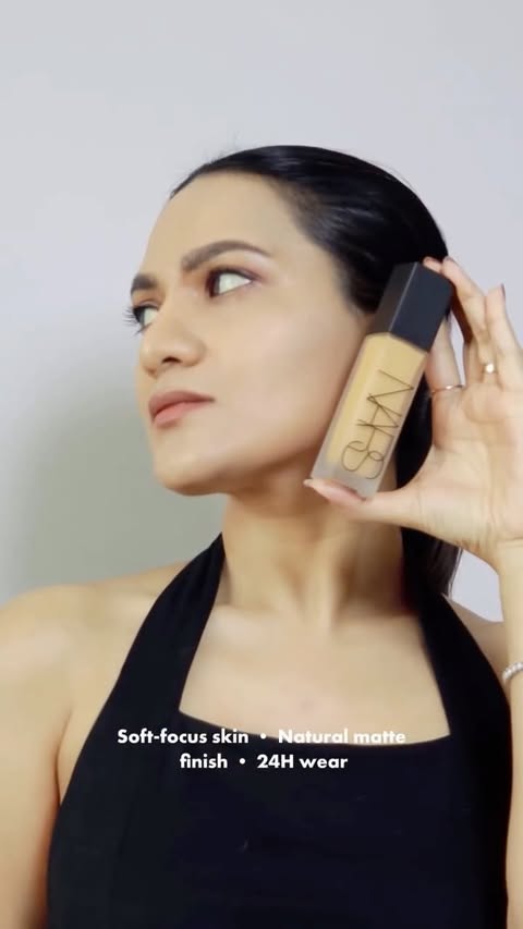 Instagram post by @nikitadmadhani for NARS Cosmetics. Caption reads: Could tell you everything about it. Or you could....