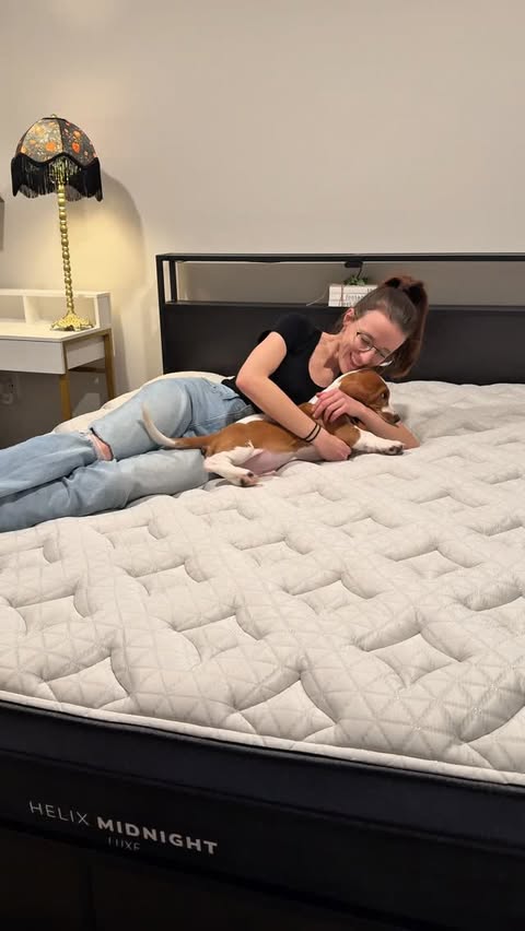 Instagram post by @strongislandnicole for Helix Sleep. Caption reads: [...] 🐶 #puppy #puppiesofinstagram #dogmom....