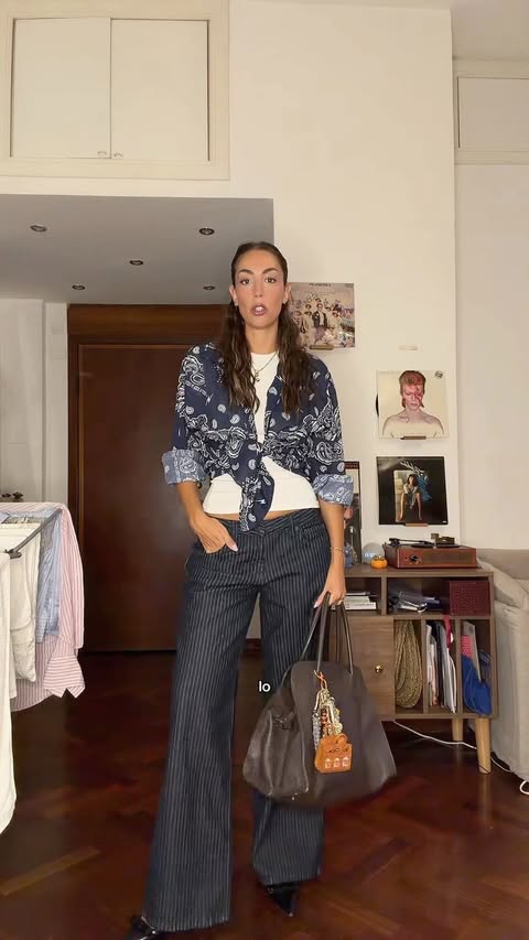 Instagram post by @_chiara.parente for MOTEL. Caption reads: Ho sbagliato borsa? 👜 jeans gifted @motelrocks....