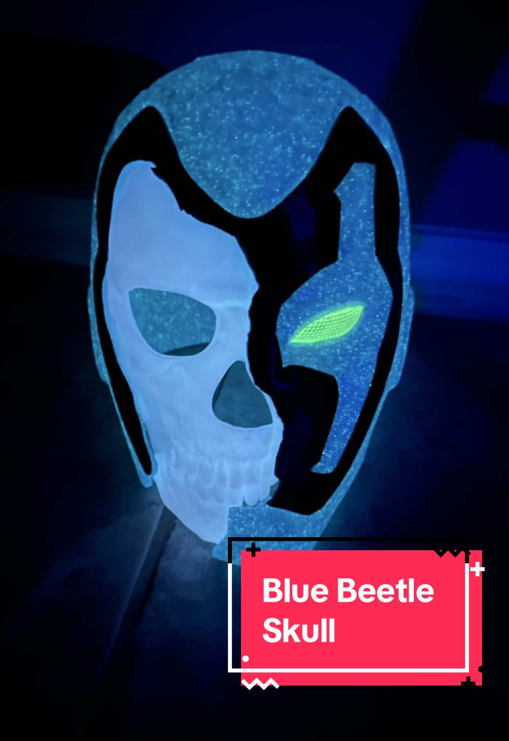 TikTok post by @daisylee2002 for Amolen. Caption reads: 3D printed Blue Beetle skull helmet with @Amolen....
