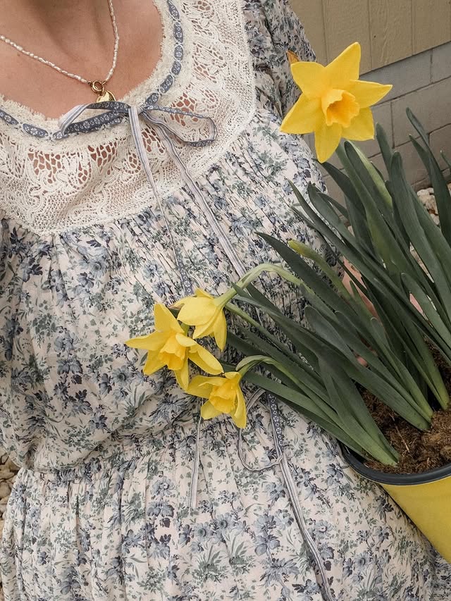 Instagram post by @salas.living for Christy Dawn. Caption reads: [...] peeks! 🌼 The most gorgeous dress c/o....