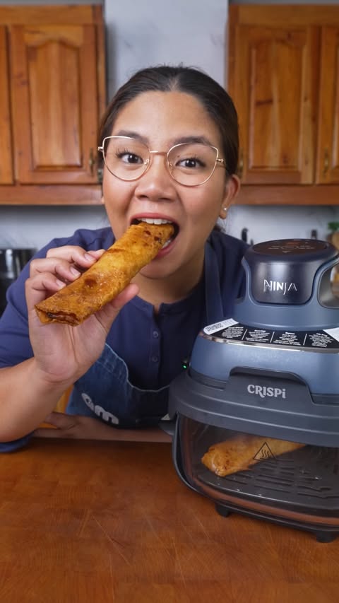Instagram post by @abigailfmarquez for SharkNinja. Caption reads: Every AIRFRYER Tip 👀 The NINJA CRISPi Masterclass....