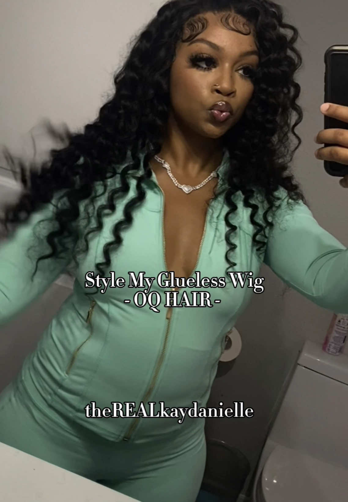 TikTok post by @therealkaydanielle for OQHAIR. Caption reads: i love wand curls now 😍 @OQHAIR @oqhairshop....