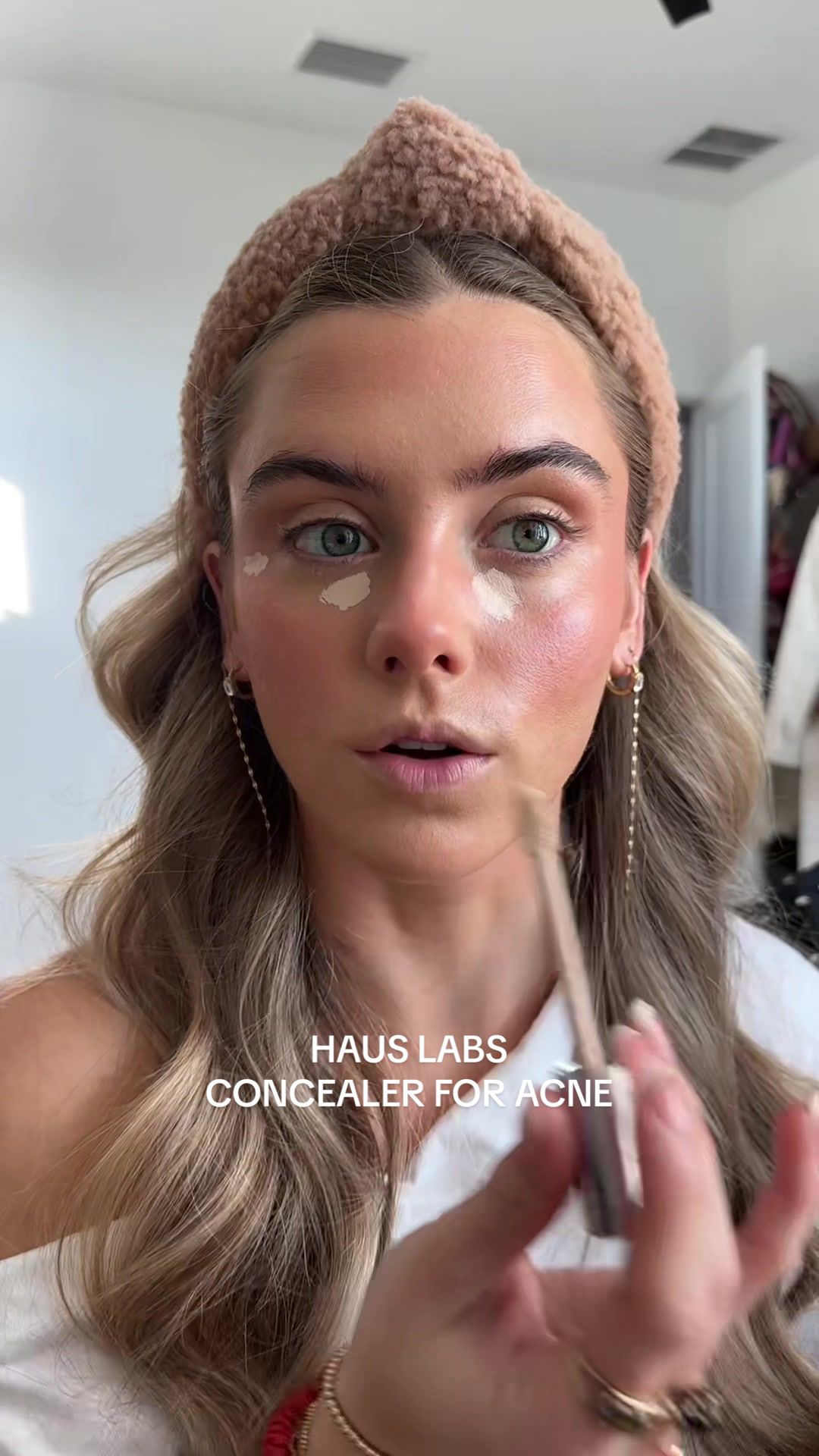 TikTok post by @sloanevosen for Haus Labs. Caption reads: [...] in the skin and this @Haus Labs concealer is....