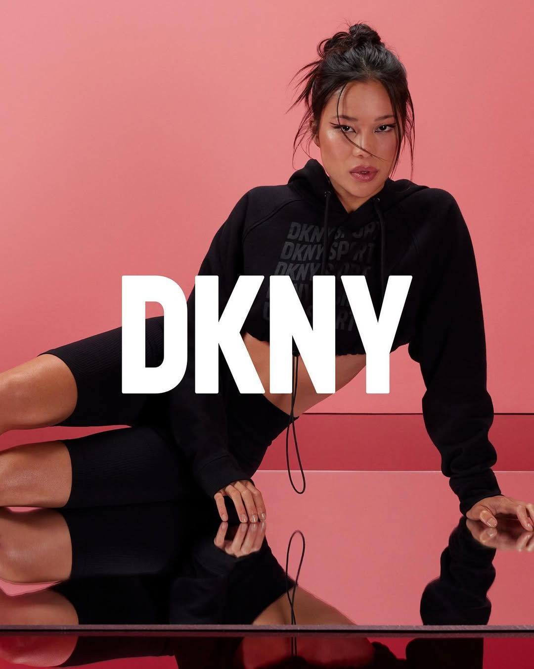 Instagram post by @alexandrameia for DKNY. Caption reads: Holiday 22 campaign 🎴@dkny #ifeeldkny #ad.
