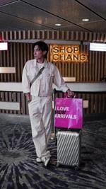 Instagram post by @thedesmondtan for iShopChangi. Caption reads: ✈️ Elevating my travel game with @iShopChangi!....