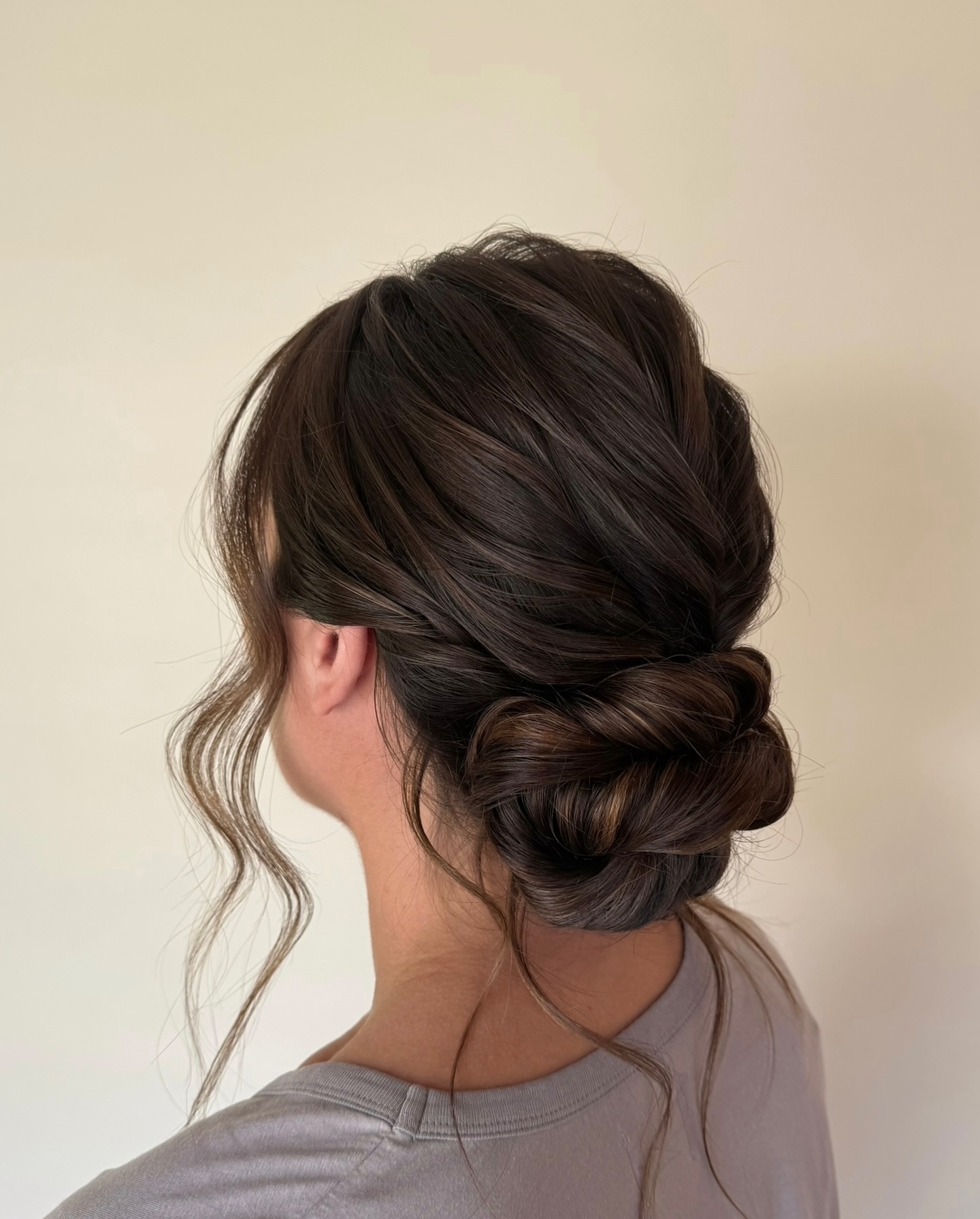 Instagram post by @updos.by.jocelyn for Moroccanoil. Caption reads: This will always be one of my favorite updo....