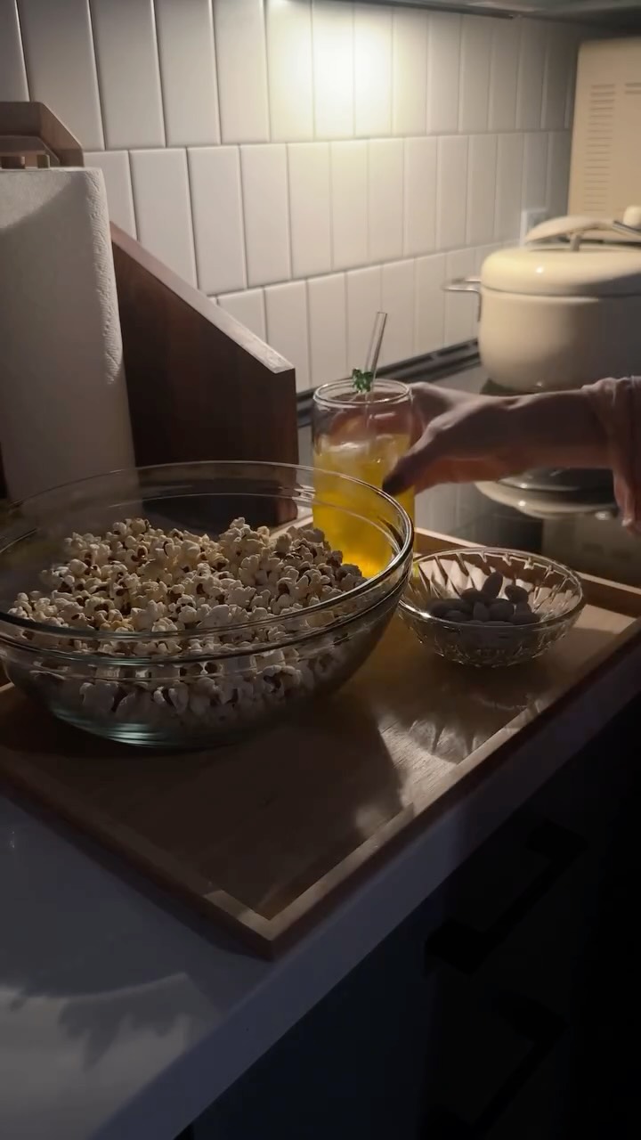 Instagram post by @idahuang_ for Sanrio. Caption reads: a cozy night in with snacks and Season 12 of Hello....