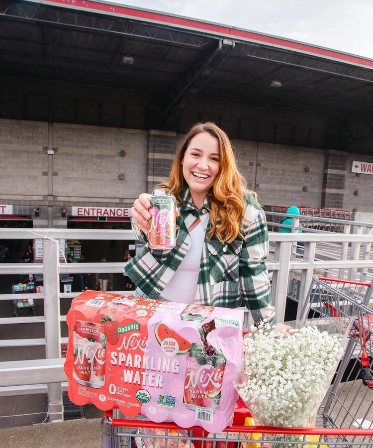 Instagram post by @mikayla.winestyle for Drink Nixie. Caption reads: My two favorite things have collided!! @drinknixie....