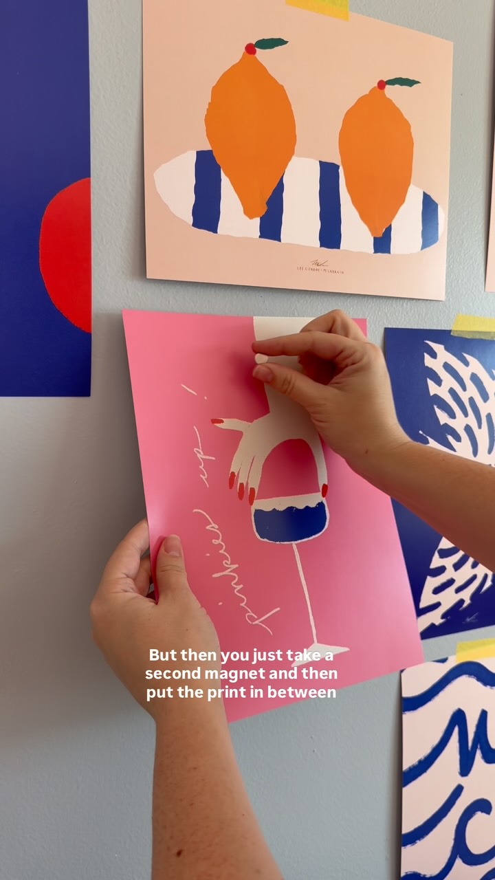 Instagram post by @bohofrisco for Society6. Caption reads: Magic Way to Hang Art!! First, I used....