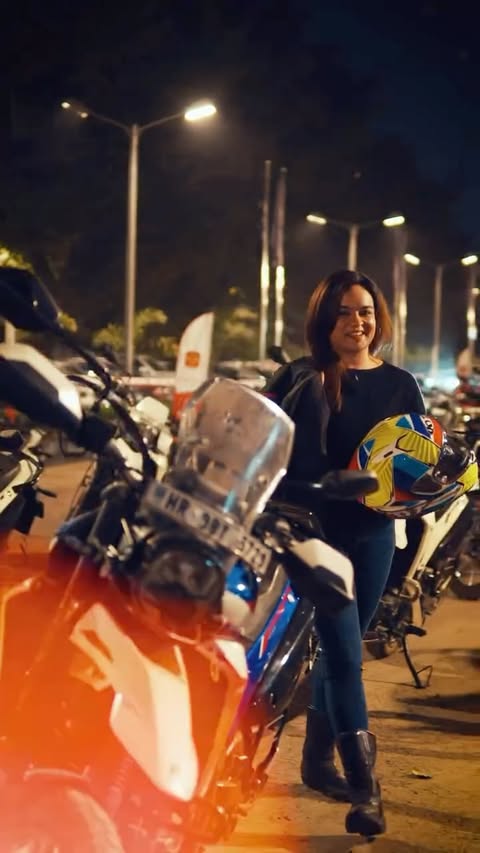 Instagram post by @racerchick_11 for Hero MotoCorp. Caption reads: [...] at the Women’s Night Rally 🏍️by....