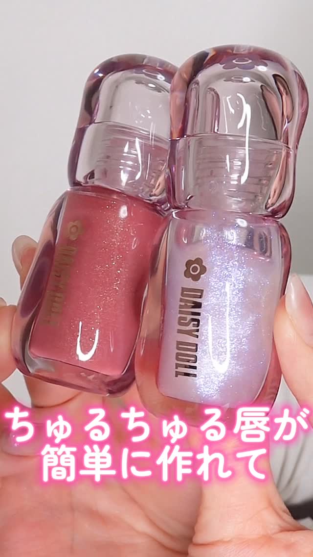 Instagram post by @25_nsk_25 for Daisy Doll by Mary Quant. Caption reads: ちゅるちゅる唇が簡単に作れてリップケアできるグロスが可愛すぎた#PR#daisydoll#デイジード....