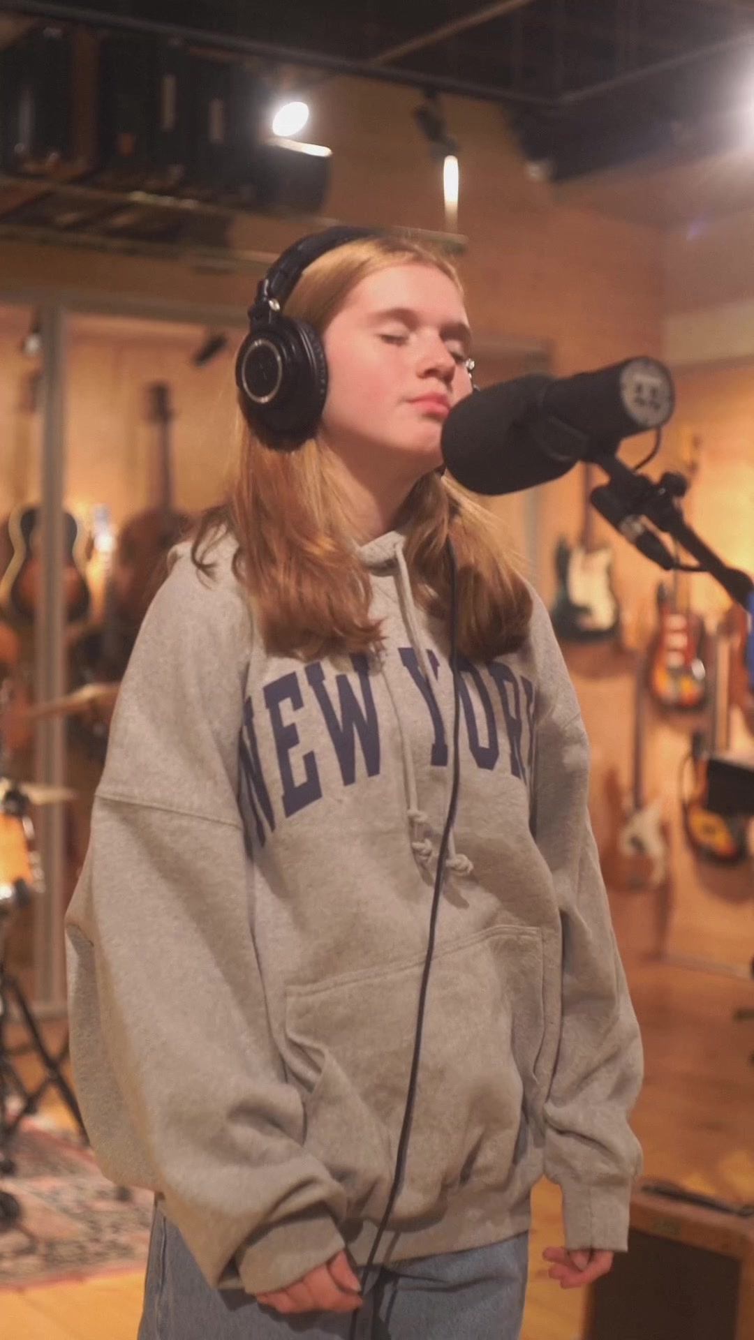 TikTok post by @emma.ems__ for Brandy Melville. Caption reads: At the @Brandy Melville Studio in NYC❤️#emma....