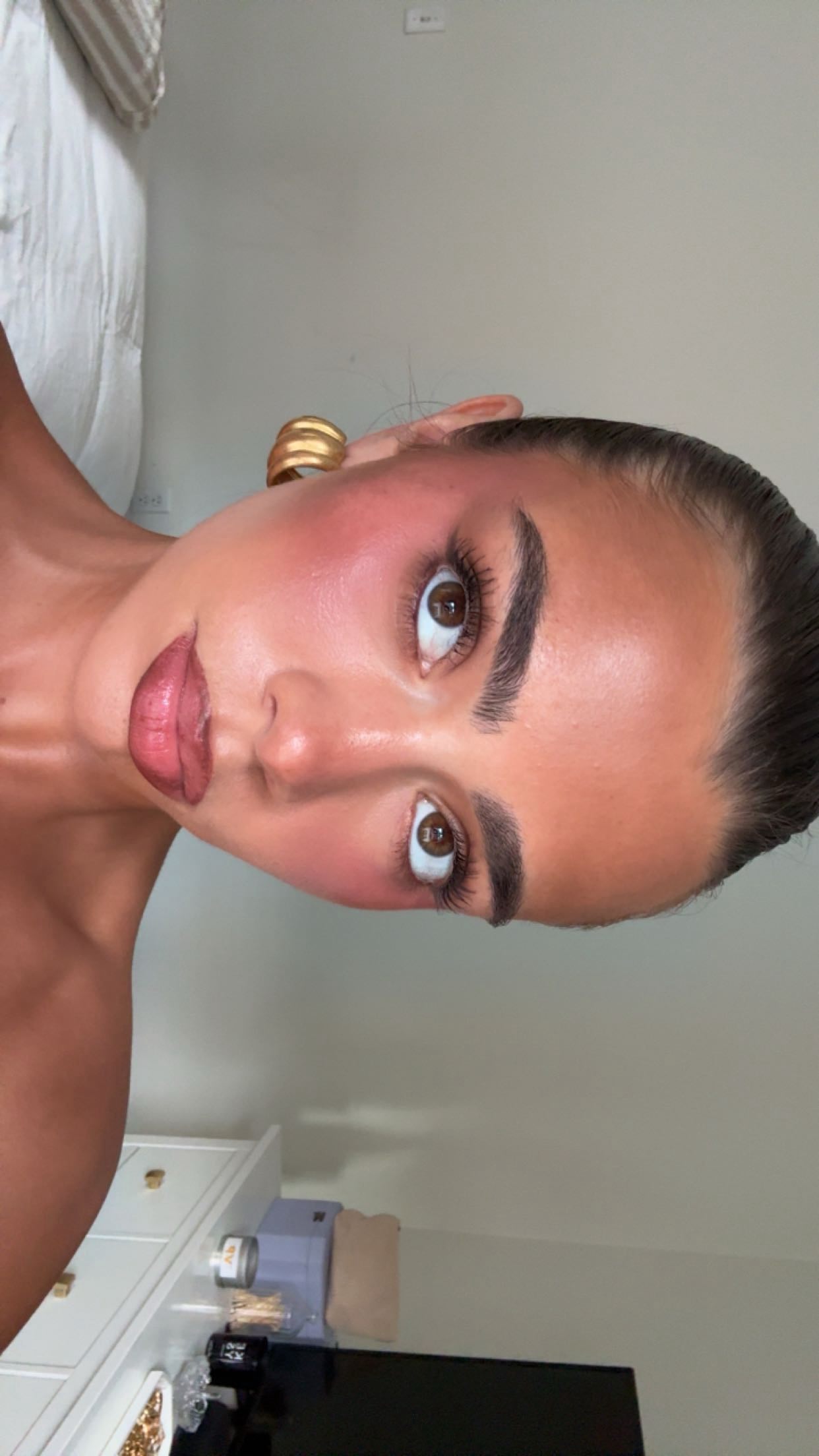 Instagram post by @alliehorta for Westmore Beauty. Caption reads: my favorite beauty hack is a body blur....