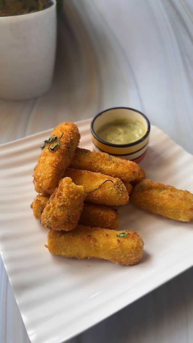Instagram post by @_.eatfirst._ for Ching's Secret. Caption reads: Sriracha Paneer Fingers....