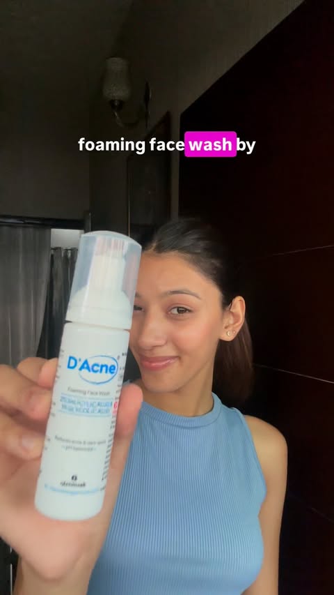 Instagram post by @officialtanisha17 for D'Acne by Glenmark. Caption reads: My acne-care essential🫶💧 @dacneindia #ad....