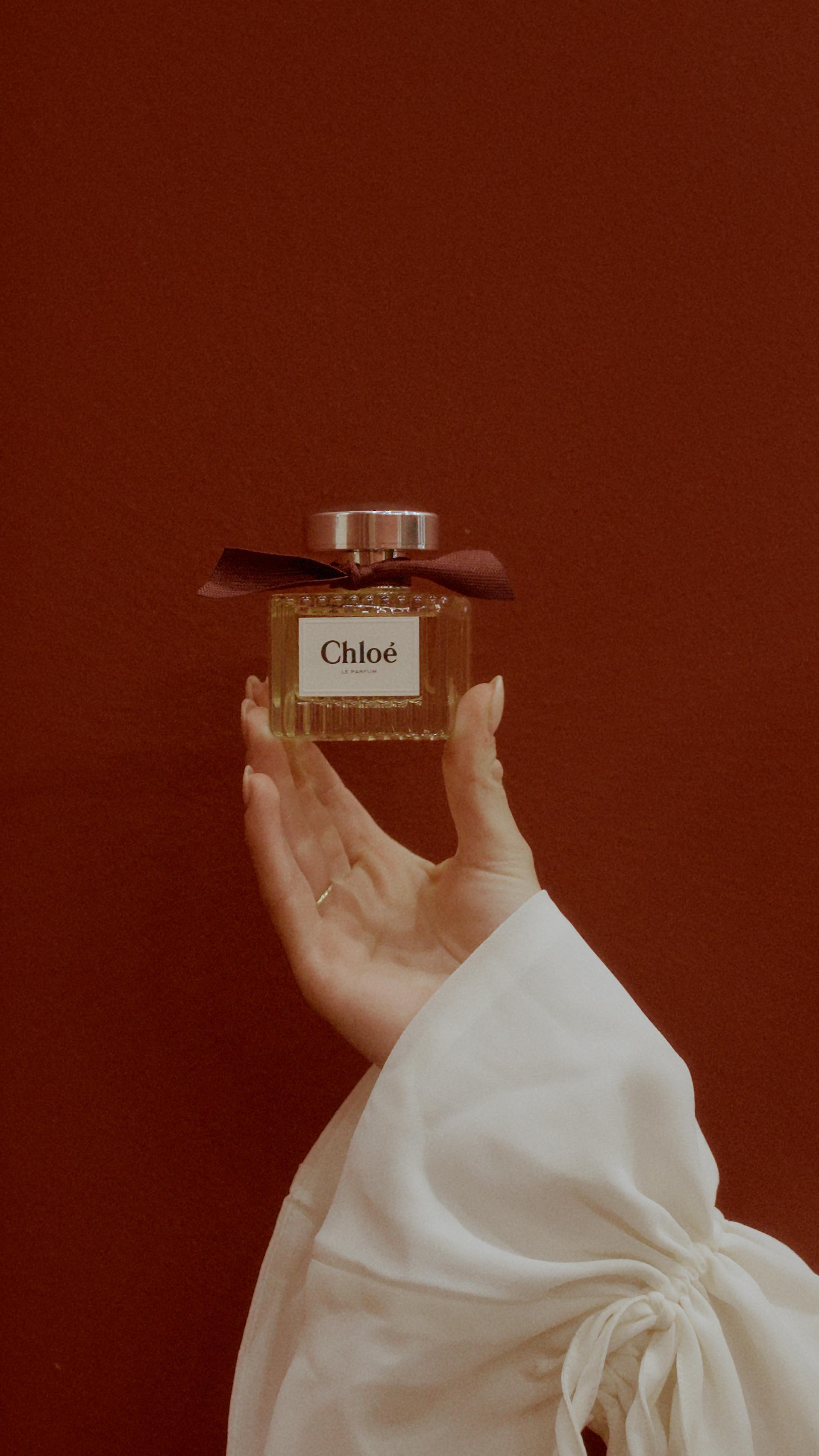 Instagram post by @madie for John Lewis. Caption reads: AD Smells like Burgundy, feels like confidence.....