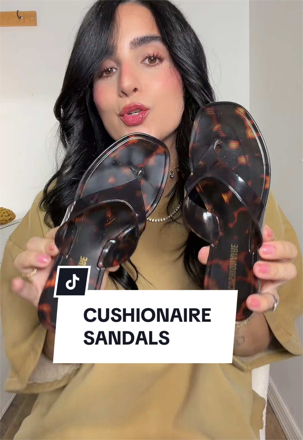 TikTok post by @sharyrivas_ for Cushionaire. Caption reads: CUSHIONAIRE Sandalias #cushionaire #sandalias....