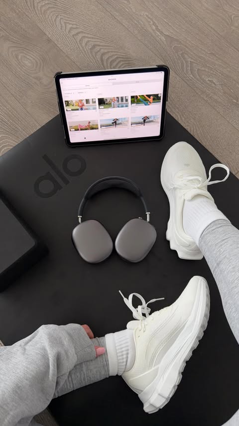 Instagram post by @serenaatthompson for Alo Moves. Caption reads: stuck in a snowstorm? no problem. The ALO Wellness....