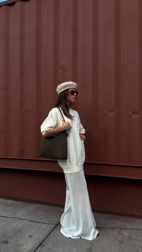 Instagram post by @ellarosemcfadin for Coach. Caption reads: Minimal, refined and quietly elevated @coach....