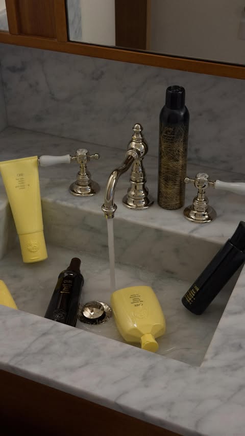 Instagram post by @juliesfi for Oribe. Caption reads: [...] that made my hair strong and thick using....
