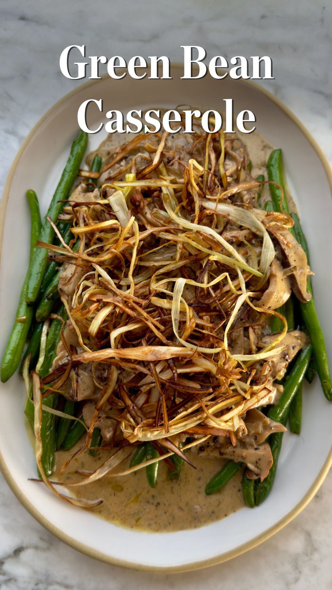 Instagram post by @foodbaby.bklyn for Food52. Caption reads: Savory Green Bean Casserole from @foodbaby.bklyn -....