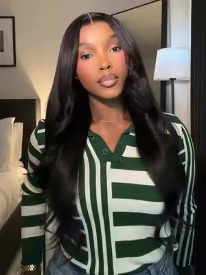 TikTok post by @claraakpe for Nadula. Caption reads: [...] 2in1 wig ? I’m obsessed 🔥😻 Hair from....